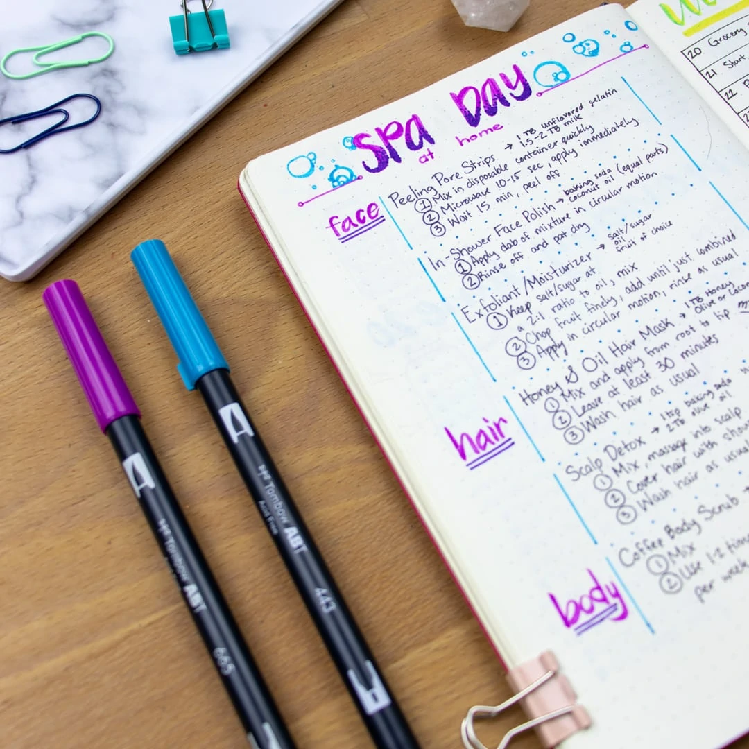 A close-up shot of the Spa Day bullet journal spread. Several DIY skincare recipes are written down.
